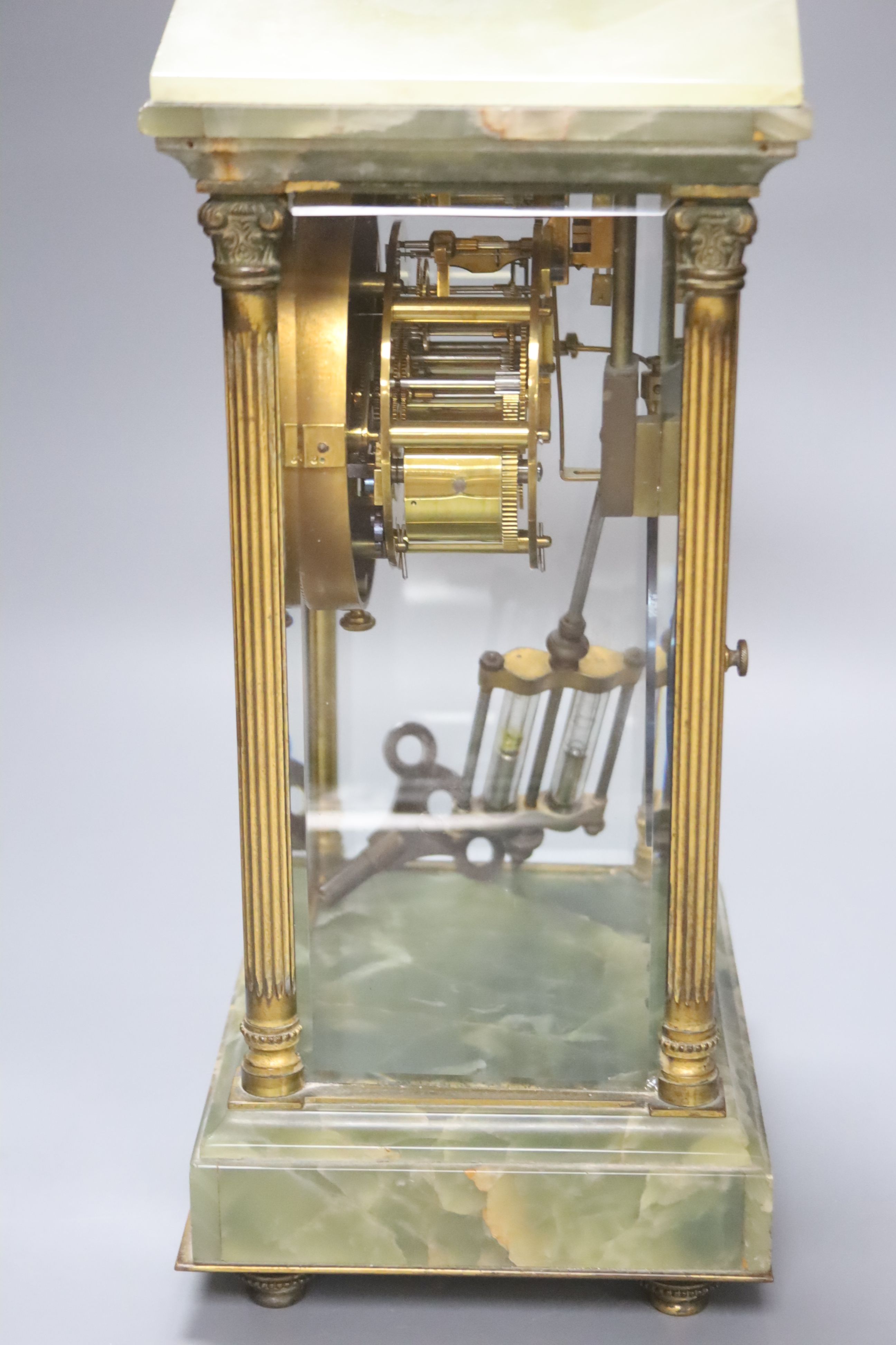 A French green onyx and gilt brass four glass mantel clock, height 32cm